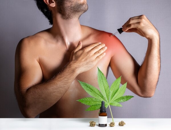 cbd-oils-designed-athletes-treat-muscle-discomfort-man-applying-cannabis-extract-oil