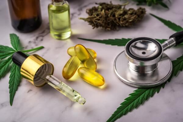 stethoscope, cbd capsule and cbd oil